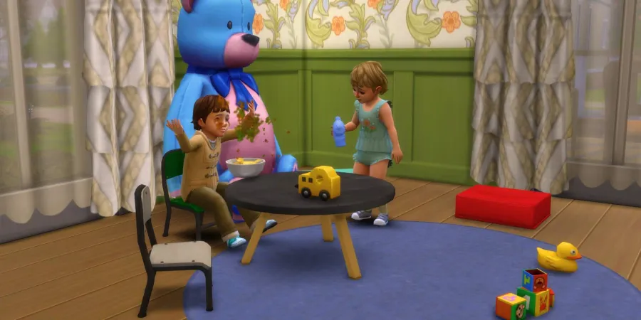 Toddlers in The Sims 4 using a table and chair set sized perfectly for them